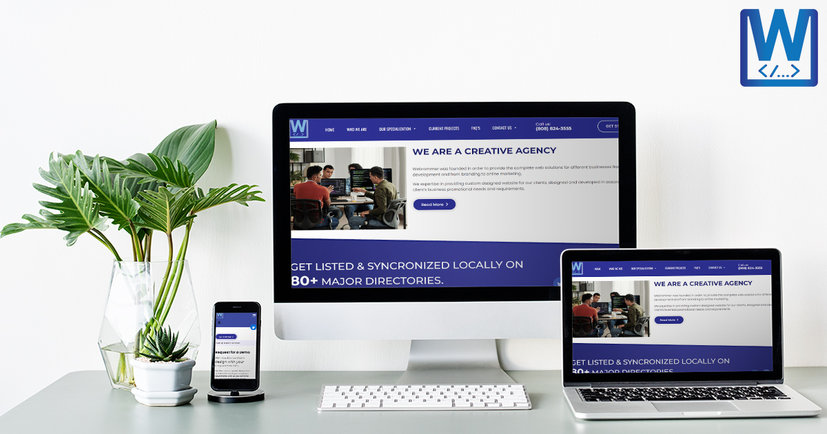 various-devices-with-webrammer-page-on-screen-on-office-desk